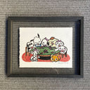 A framed art print featuring a cute cartoon illustration of dogs playing poker around a green table.