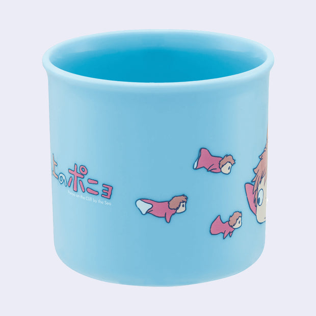 Small blue plastic cup with a graphic of Ponyo with her little sisters, who carry her same likeness just smaller versions.
