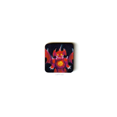 Small square illustration on a tiny wood panel of a red monster with spiked wings.