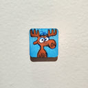 Small illustration on a tiny panel of Bullwinkle the cartoon moose.