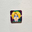 Colored pencil illustration of Link from Legend of Zelda on a tiny wood panel.