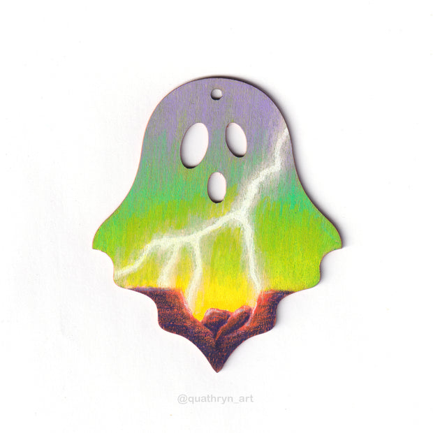 Ghost shaped wood panel with an illustration of a bright green and purple sky over canyons. A streak of bright white lighting cuts through the sky.