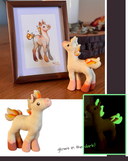 Sculpture of a small white unicorn with flames for a mane and pink coloring on its hooves and snout. It is compiled to show various angles, including a photo of it looking at a painting of itself.