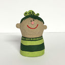 Ceramic sculpture of a boy's top half, without arms. He wears a striped green sweater and has a small chameleon atop his head.