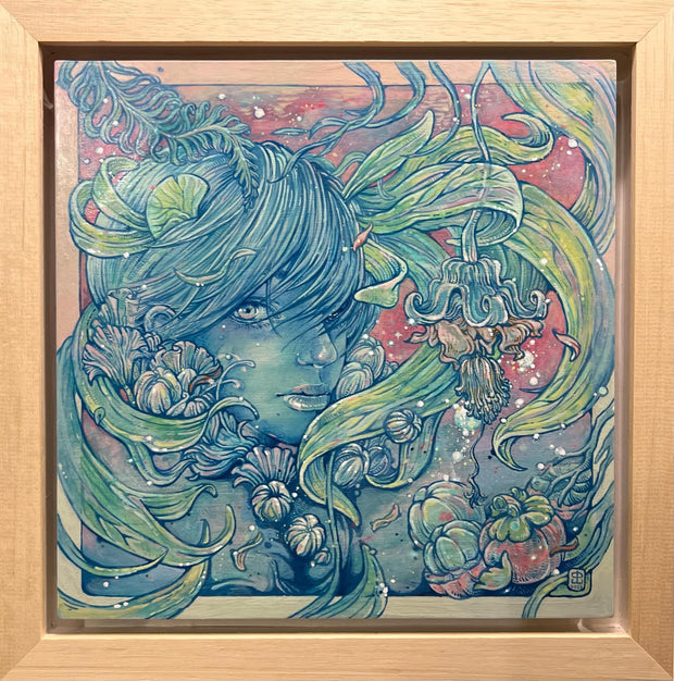 Illustration of a blue woman, looking through long bangs at the viewer. Weeds wrap around her and several flowers and foliage frame the setting. Color palette is muted blue, green and red. Piece is in boxed frame.