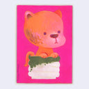 A colorful painting of a cute orange cartoon cat, peeking over a green and white cup, set against a bright pink background. The painting is signed 'SHIHO PATE' on the left side.