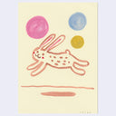 Cartoon rabbit with colorful circles on a light yellow background
