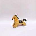 Ceramic sculpture of a brown horse with a black mane and tail, with a blanket on its back and poppy flower designs on the side of its body.