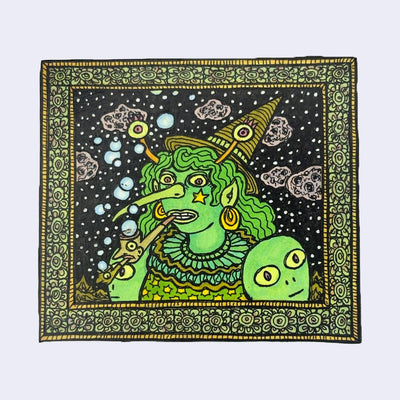 llustration made with many lines, giving it the feel of a folk art woodcut on a rectangle wood panel of a green witch with wavy hair, gold earrings and a large nose. She smokes a pipe shaped like someone's head, which in turn smokes a smaller pipe. She has alien heads for shoulder pads.
