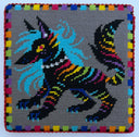 A square needlepoint canvas featuring a stylized black dog with vibrant rainbow stripes, a light blue mane, and a white collar, set against a gray background with a colorful border.