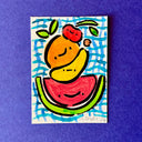 Artwork featuring a whimsical illustration of fruit, including a watermelon slice, banana, orange, and cherry, set against a blue hand-drawn grid background. The print is displayed flat on a textured purple surface.