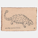 A black ink sketch of anankylosaurus on textured beige paper with torn edges, shown against a light gray background.