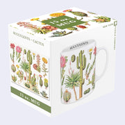 White mug with an all around wrap design of vintage illustrations of succulents and various desert themed flowers. In box.