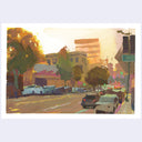 An impressionistic painting of a city street scene at sunset, featuring trees, buildings, parked cars, and warm golden light, presented with a white border on a light gray background.