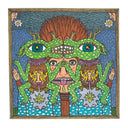 Colorful print of 3 people, with deer like creatures stacked atop of 2 of the people's faces. The creatures are perfect mirrors of one another, facing each other with their mouths touching.