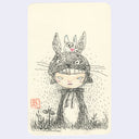 Pen illustration on cream colored paper of a girl dressed as Totoro.