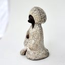 Ceramic fox figurine with a cracked glaze finish on a white background