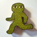 Die cut wooden sculpture with a flat back to hang on a wall of a leaf creature, in a running pose.