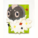 A handmade paper cutout art piece featuring a cute cartoon character with large eyes, a dark gray head, and a fluffy white body, set against a textured lime green square background.