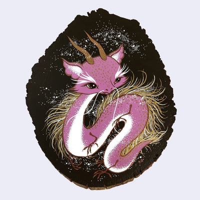 Painting on wood slice of a purple cartoon style dragon, with wispy brown and white whiskers on its back and sparkly eyes. Background is pure black with many white dots, like stars or light clusters.