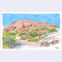 A colorful landscape drawing of a desert rock formation with green shrubs and a pale path under a bright blue sky, shown on a light gray background.