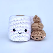 Crocheted roll of toilet paper with a cute smiling face, next to a crocheted poo swirl with a cute emotive face.