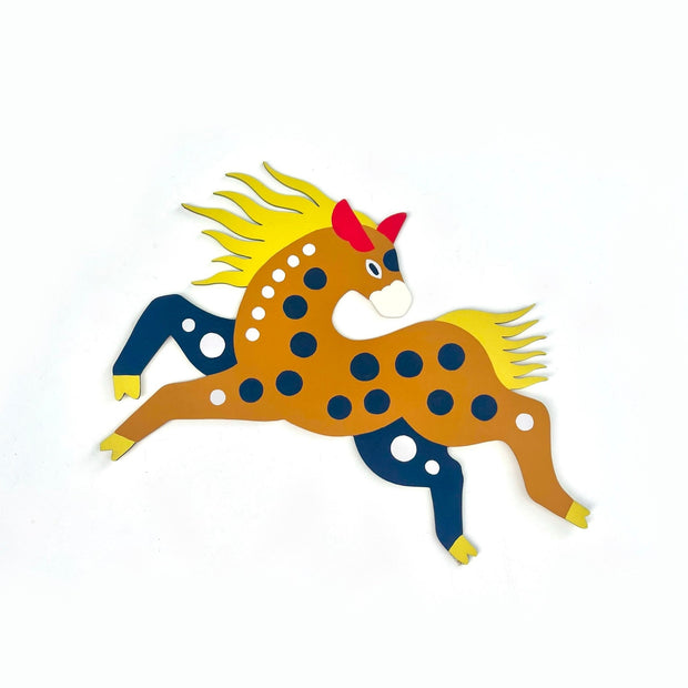 Die cut, brightly painted wooden sculpture of a folk art style horse with polka dots and a wild yellow mane. 