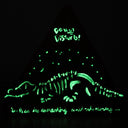 A triangular black plaque shown glowing in the dark, with green illuminated text reading 'Do Not Disturb!' and a green dinosaur skeleton illustration across the front.