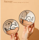 Set of 2 bowls with graphics of Snoopy, sitting or laying.