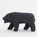 Wooden figurine of a black panther, with a growling expression.