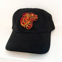 Black cap with a fiery kaiju design on a white background