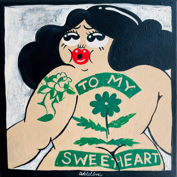 Painting of a cartoon pin up style woman, with her head turned over her shoulder looking back and up. Her nude back is exposed with a green tattoo that reads "To My Sweetheart" with floral motifs.
