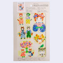 Pack of multi-sticker sheet with colorful cat-themed designs on a beige background