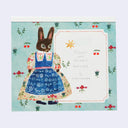Cover for memo pad with designs by Aiko Fukawa, with an illustration of a rabbit in an ornate dress.