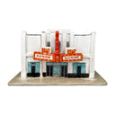 Ceramic sculpture of a model of Bob Baker Marionette Theater.