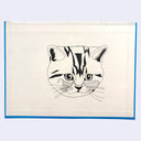 Black ink drawing on the backside of a hardcover book cover of a cat head.