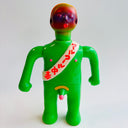 Green vinyl figure of a man with a sash.