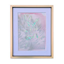 Framed abstract artwork featuring a textured, metallic iridescent design with pink, silver, and teal elements, set in a light wood frame with a lavender mat.