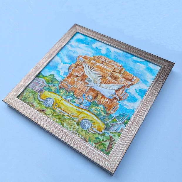 Framed artwork of a landscape with a building and a bird on a blue background