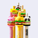 Set of colorful pens shaped like hamburgers and animals on a white background