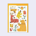 Small greeting card with illustrations of animals with gold foil detailings. Backed by a yellow envelope.