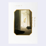 Book cover for The Art of yoco, mainly white with a framed illustration of a man sitting on the edge of a bathtub with his clothes on, smoking a cigarette.