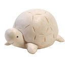 White turtle figurine on a white background