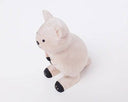 Wooden figurine of a Quokka, standing on its large hind legs.