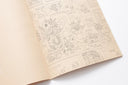 Open book with detailed illustrations on a white background, meant for coloring in.