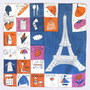 A square woven textile or scarf featuring a colorful French-themed grid pattern with illustrations of Parisian items and a large Eiffel Tower motif on a blue background.