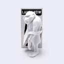 White monkey figurine with a 'Laugh Now' box on a light gray background
