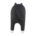 Wooden figurine of a black and natural wood color cat with an arched back.