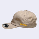 Light tan cap with a yellow-orange ginkgo leaf in the middle. "Giant Robot" is written in cursive along the side of the cap.
