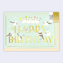 Birthday card with bold gold lettering that reads "Happy Birthday" with cartoon birds around it with party hats and balloons.